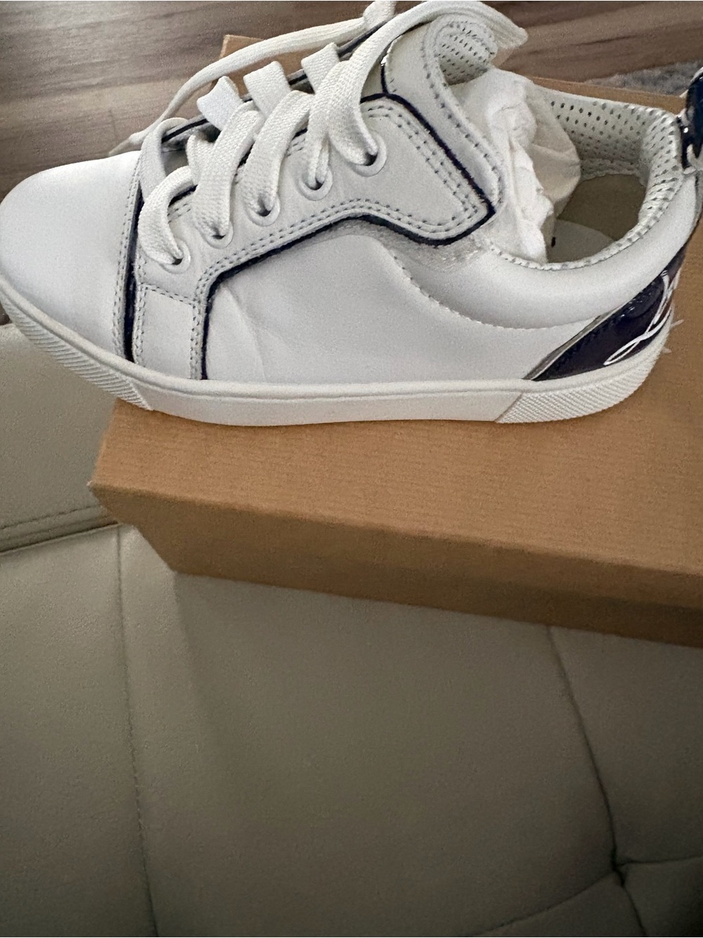 Kids White Low-Top Christian Louboutin Sneaker with Navy Trim